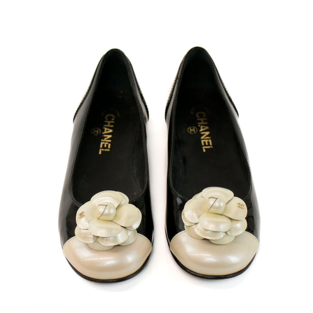 Chanel Black 
Cream Patent Leather CC Camellia Ballet Flats