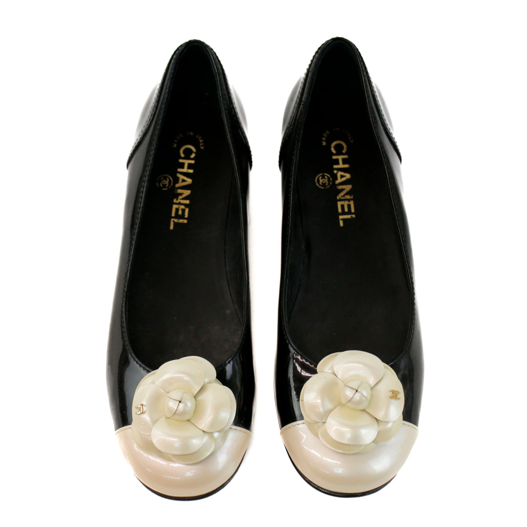 Chanel Black 
Cream Patent Leather CC Camellia Ballet Flats