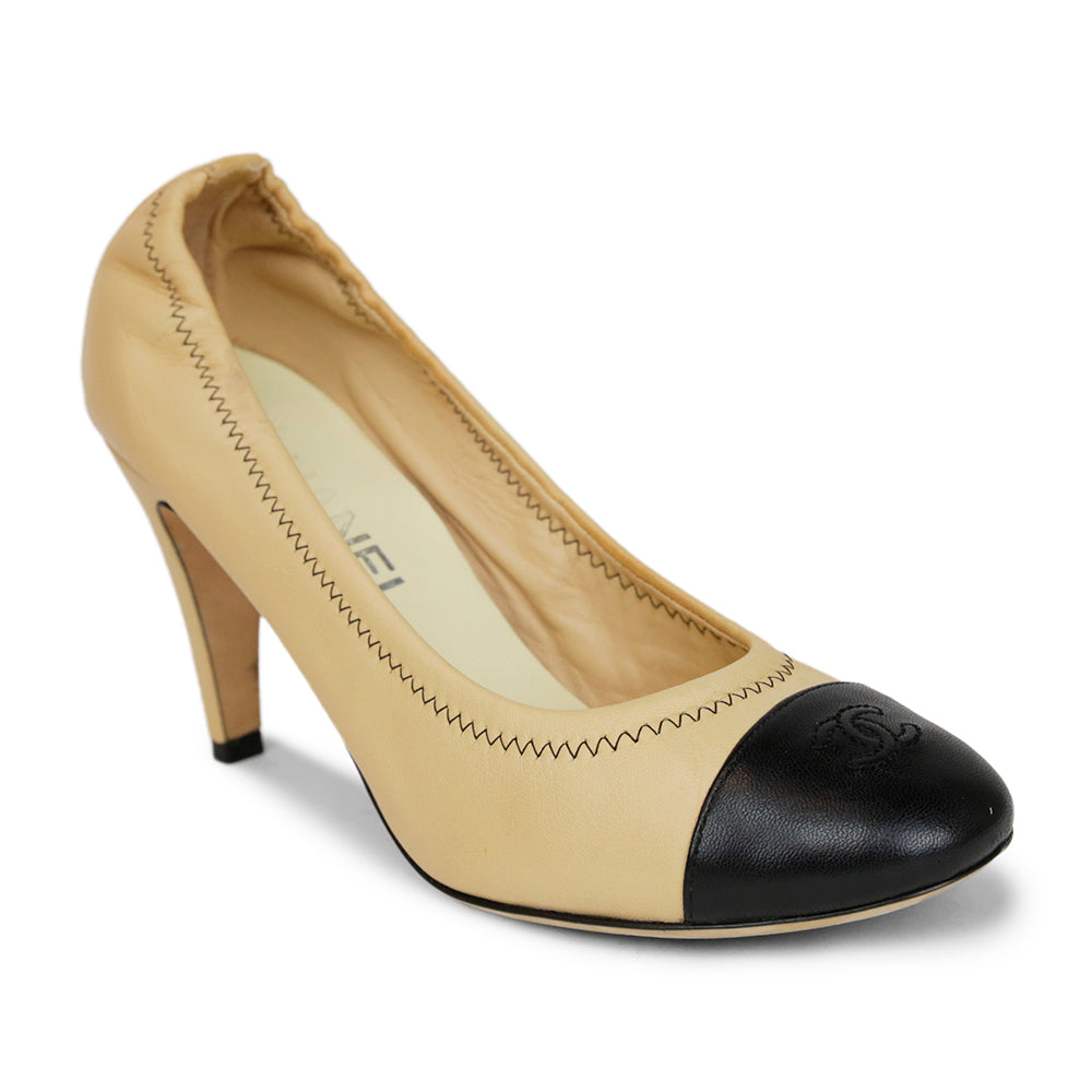 Chanel Beige 
Black CC Cap Toe Pumps