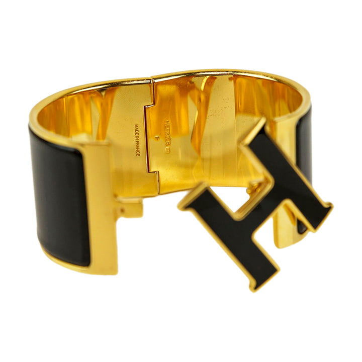 Hermès Black 
Gold Enamel Extra Wide Clic Clac H Bracelet