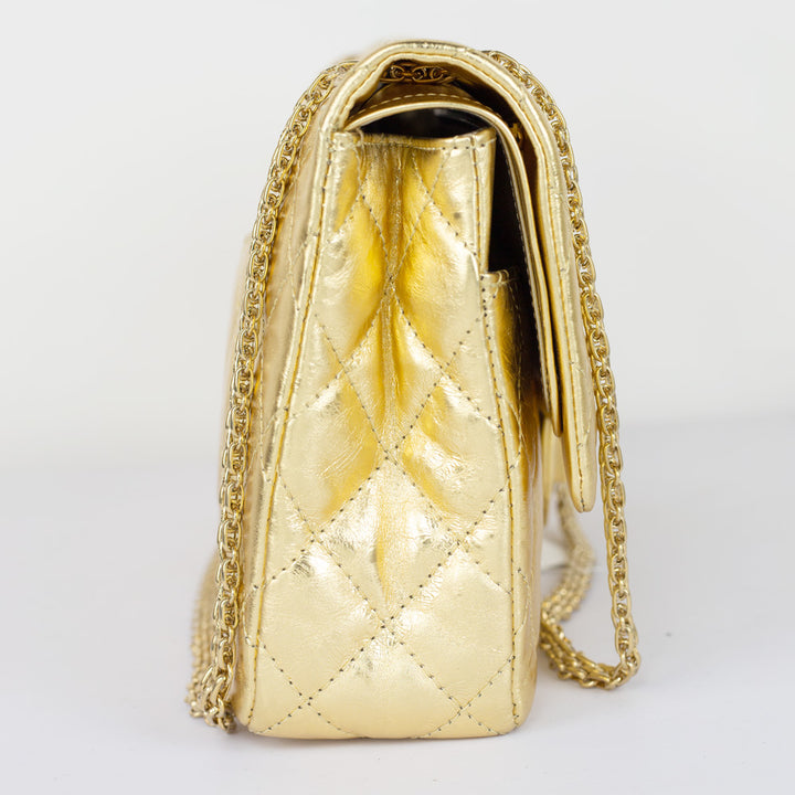 side view of Chanel Gold Reissue 227 Double Flap Bag