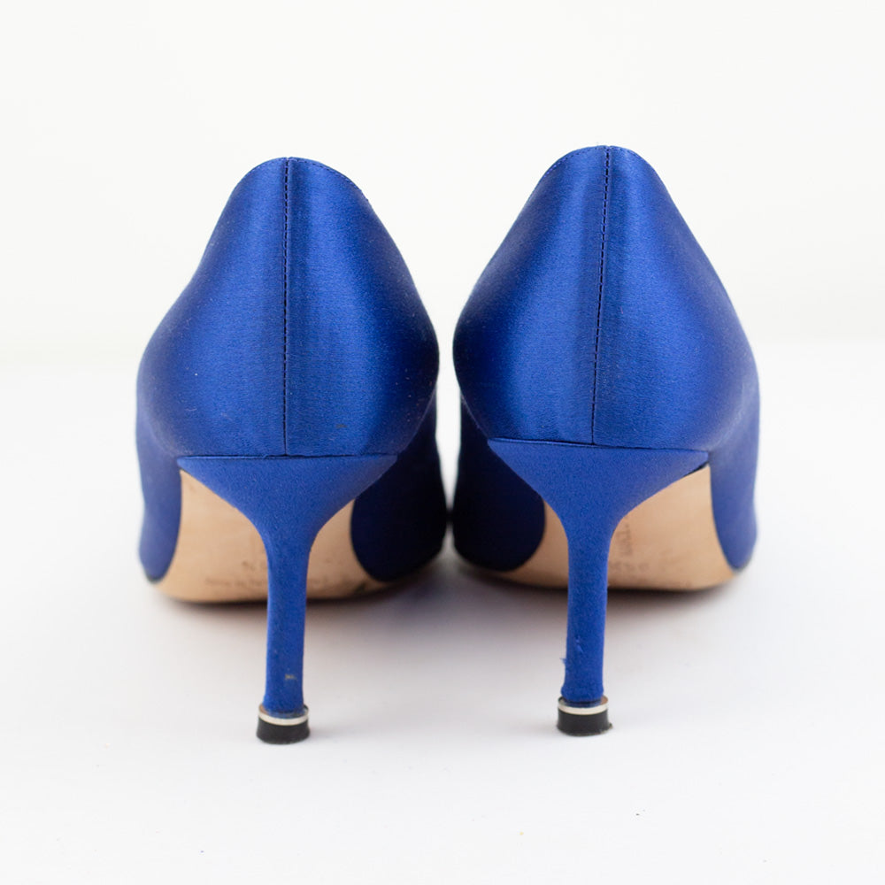 heel view of Manolo Blahnik Hangisi Jeweled Blue Satin Pumps