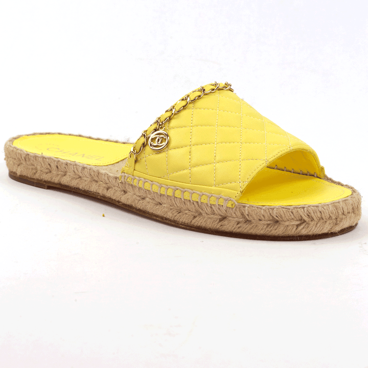 side view of Chanel Yellow Quilted Chain Espadrille Slide Sandals