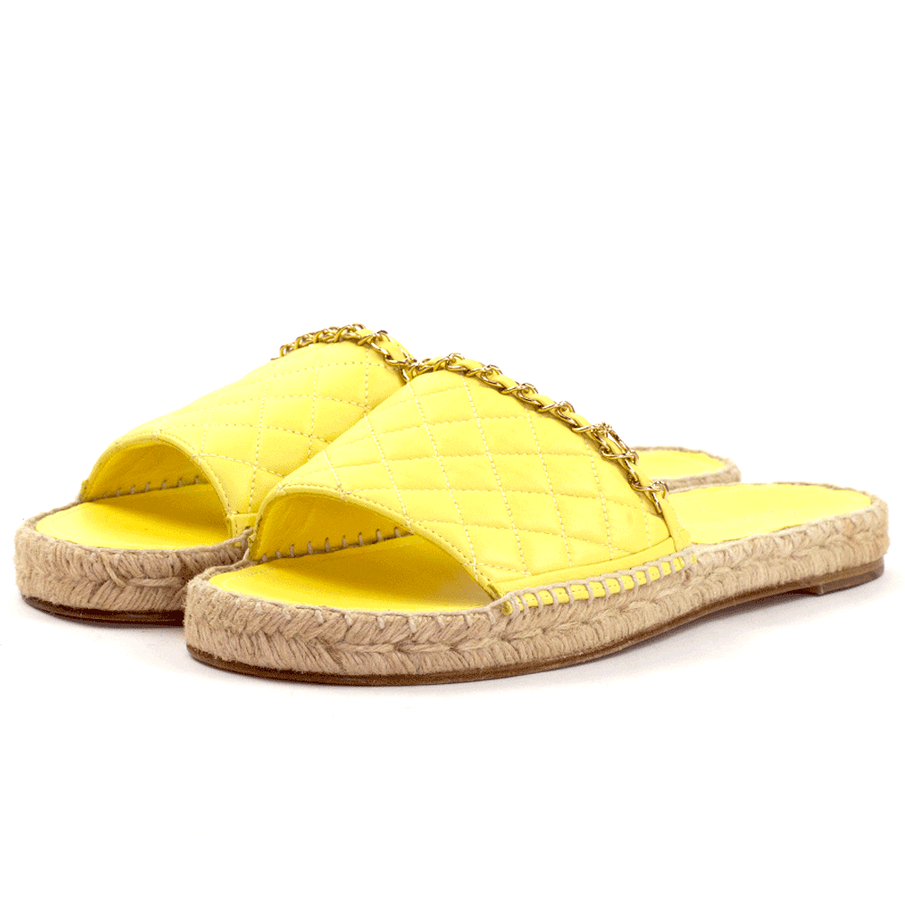 side view of Chanel Yellow Quilted Chain Espadrille Slide Sandals