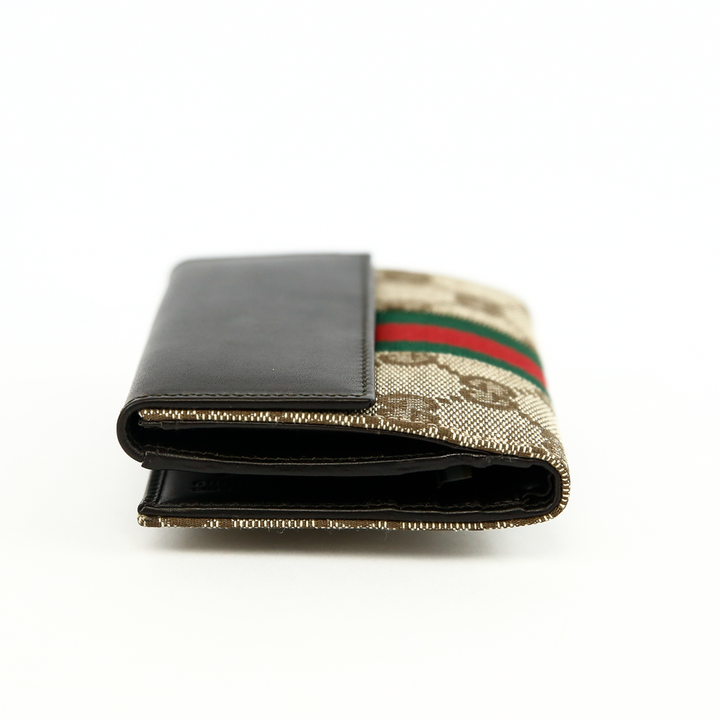 side view of Gucci GG Canvas 
Leather Jackie Compact Wallet