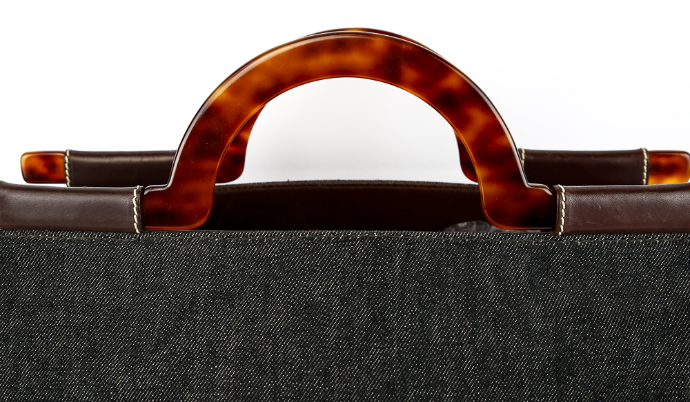 handle view of Chanel Black Denim CC Tortoise Handle Tote