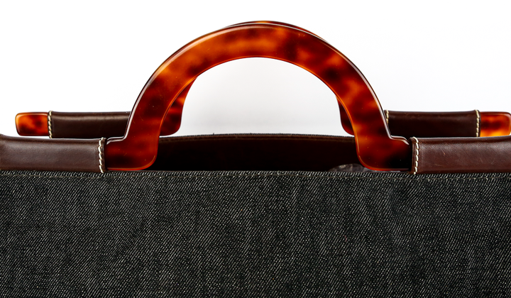 handle view of Chanel Black Denim CC Tortoise Handle Tote