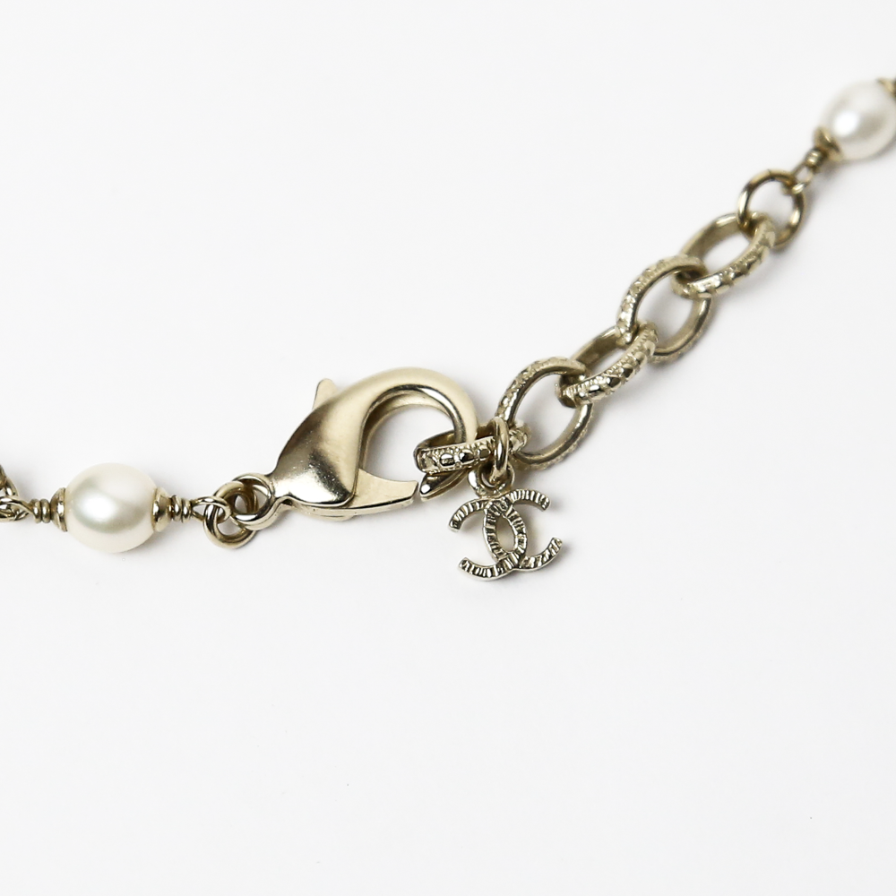 clasp view of Chanel Strass 
Enamel Pearl Station Necklace