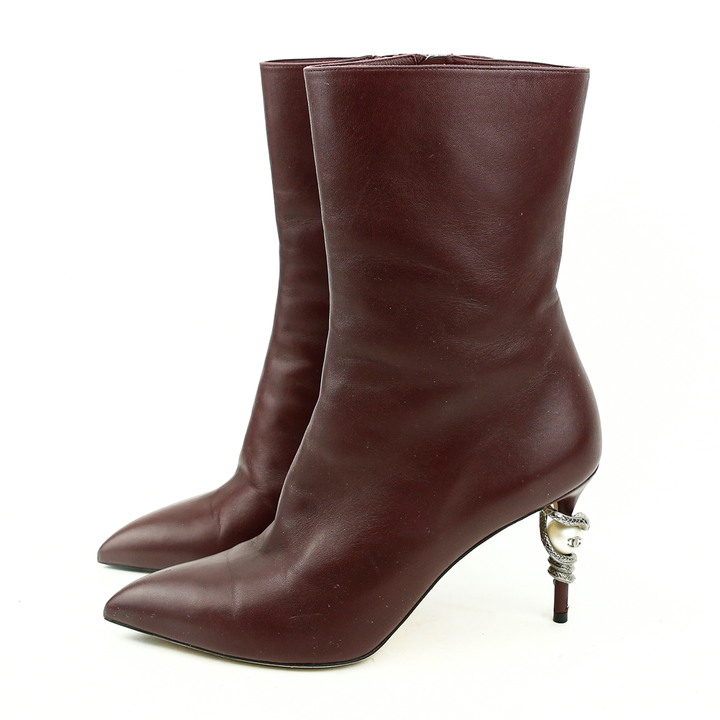 side view of Chanel Burgundy Leather Runway Pearl Boots