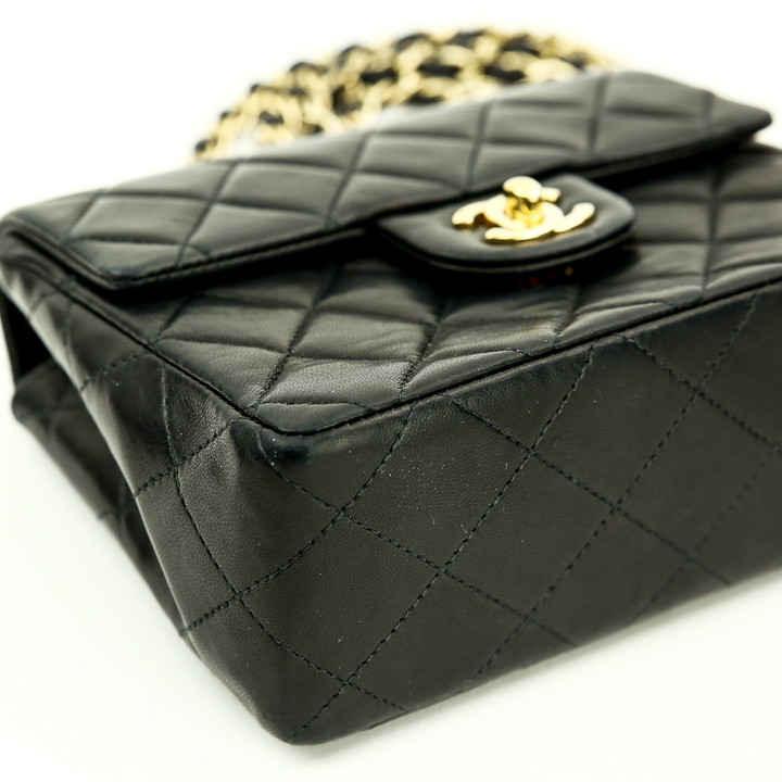 Corner view of Chanel Black Lambskin Classic Square Mini Flap Bag (2000)