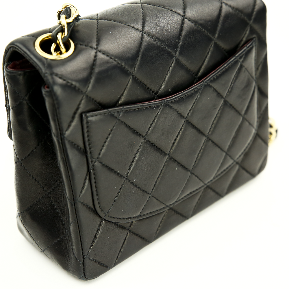 Back view of Chanel Black Lambskin Classic Square Mini Flap Bag (2000)