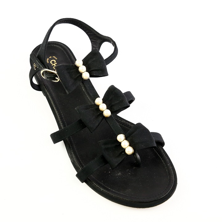 Top view of Chanel Black Fabric 
Pearl Bow Sandals