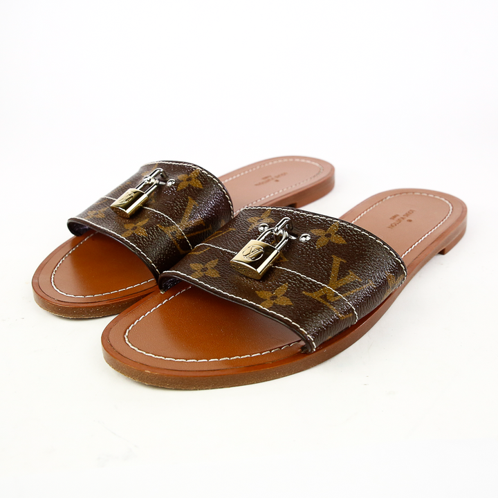 SIde view of Louis Vuitton Lock It Monogram Canvas Slides