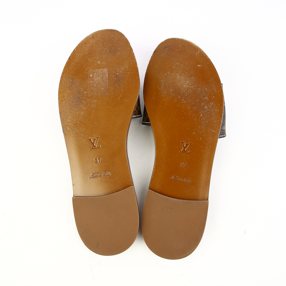 Sole veiw of Louis Vuitton Lock It Monogram Canvas Slides