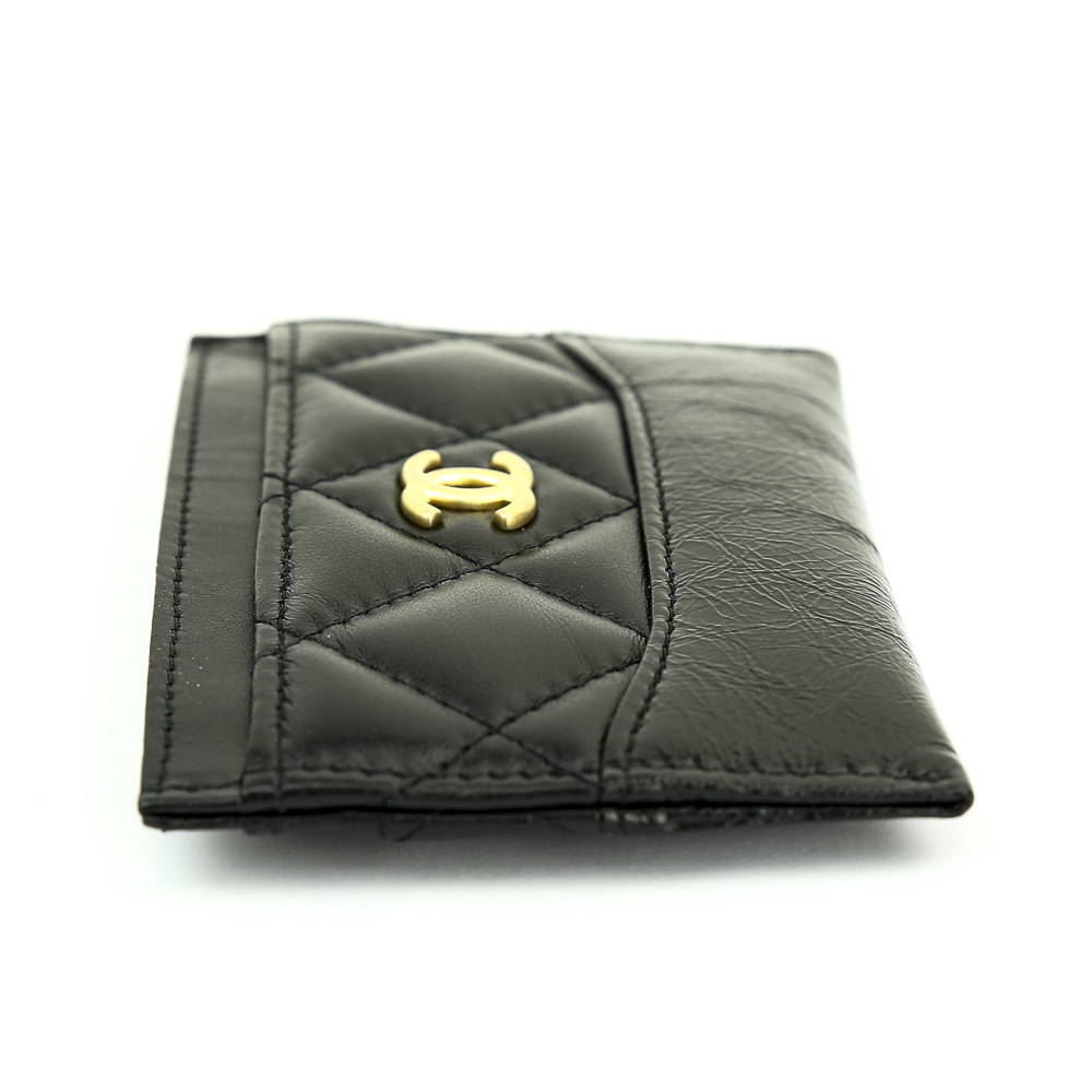 Side view of Chanel Gabrielle Quilted Black Lambskin 
Calf Leather Card Case