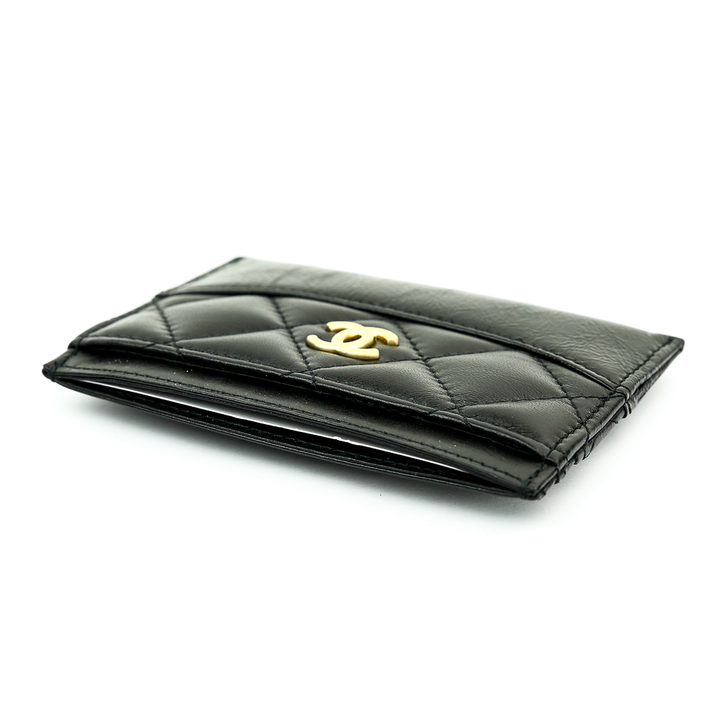 Top view of Chanel Gabrielle Quilted Black Lambskin 
Calf Leather Card Case