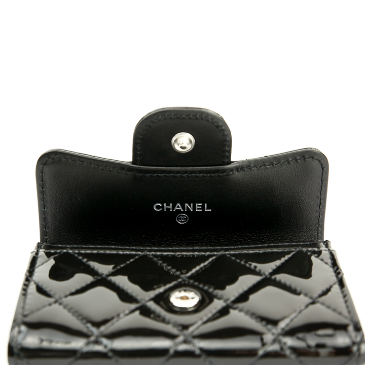 Flap view of Chanel 2.55 Reissue Quilted Black Patent Leather Card Holder