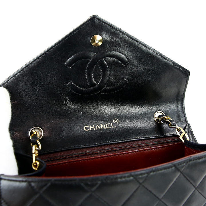 Interior flap view of Chanel Vintage Black Quilted Envelope Flap Bag