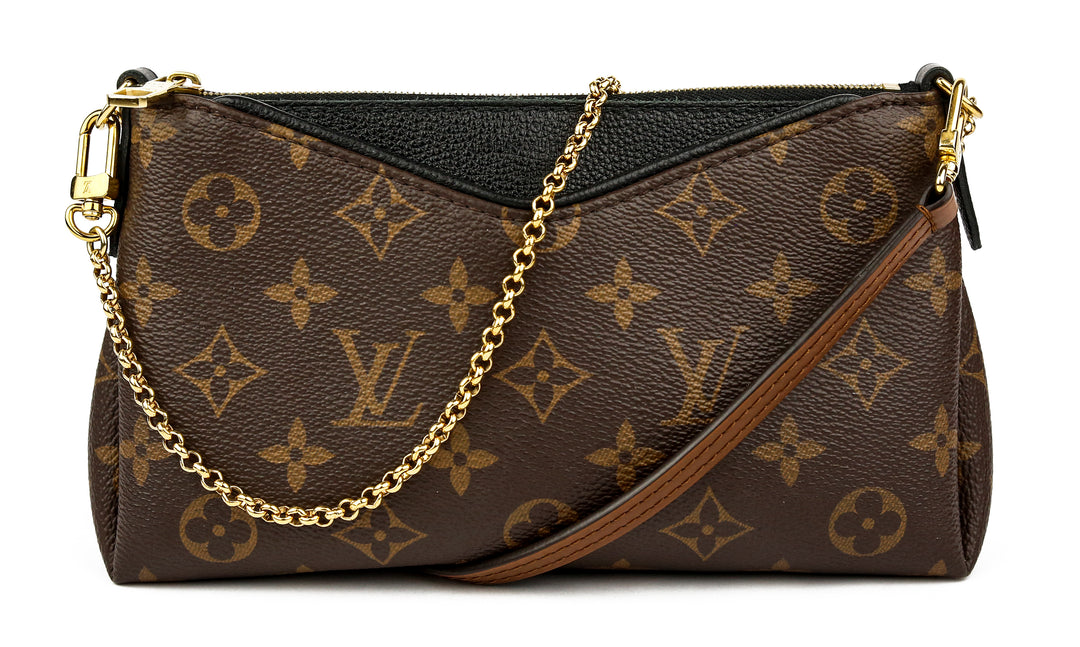 Louis Vuitton Monogram Coated Canvas 
Leather Pallas Clutch