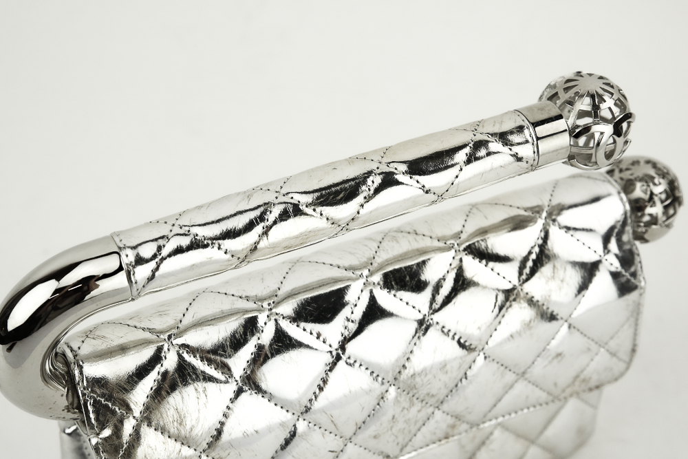 Top view of Chanel Around The World Silver Quilted Clutch