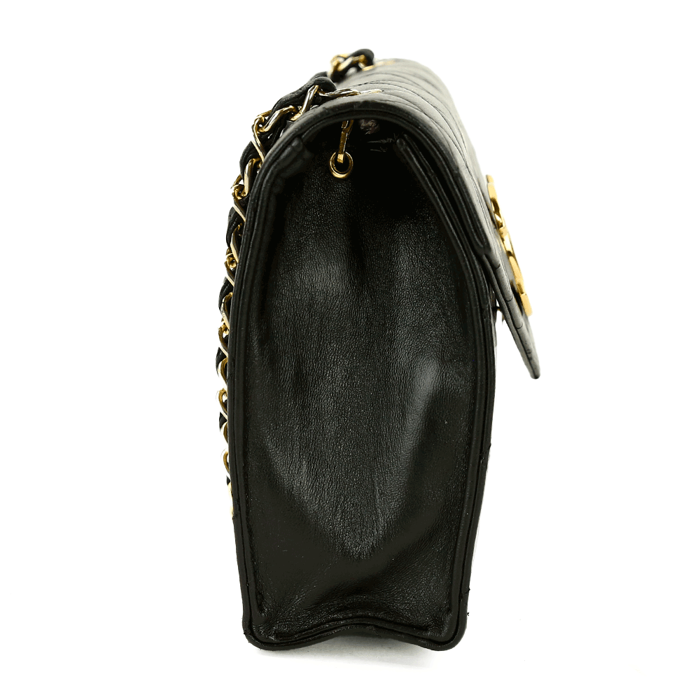 side view of Chanel Vintage Black Quilted Envelope Flap Bag