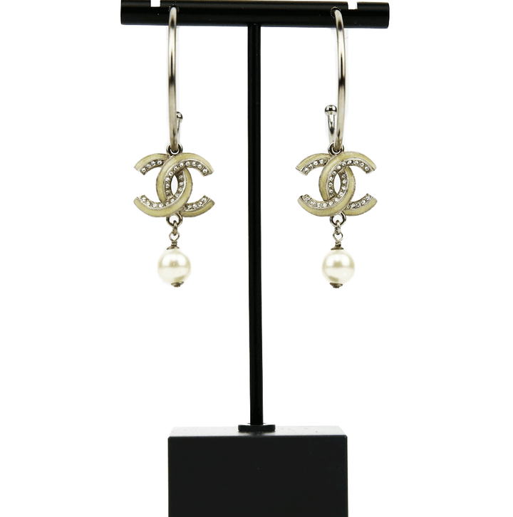 front view of Chanel Silver 
Enamel CC Hoop Earrings