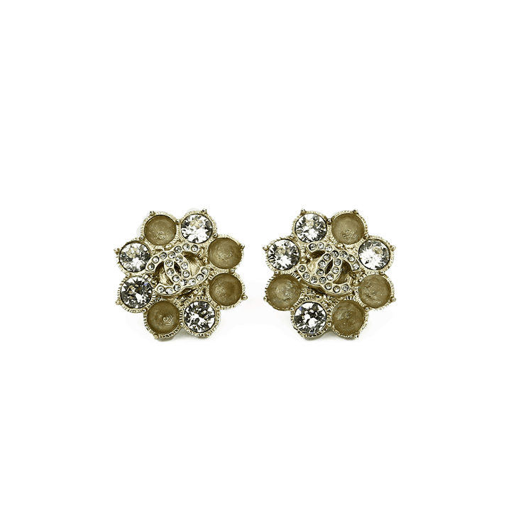 FRont view of Chanel Gold Tone 
Crystal CC Flower Earrings