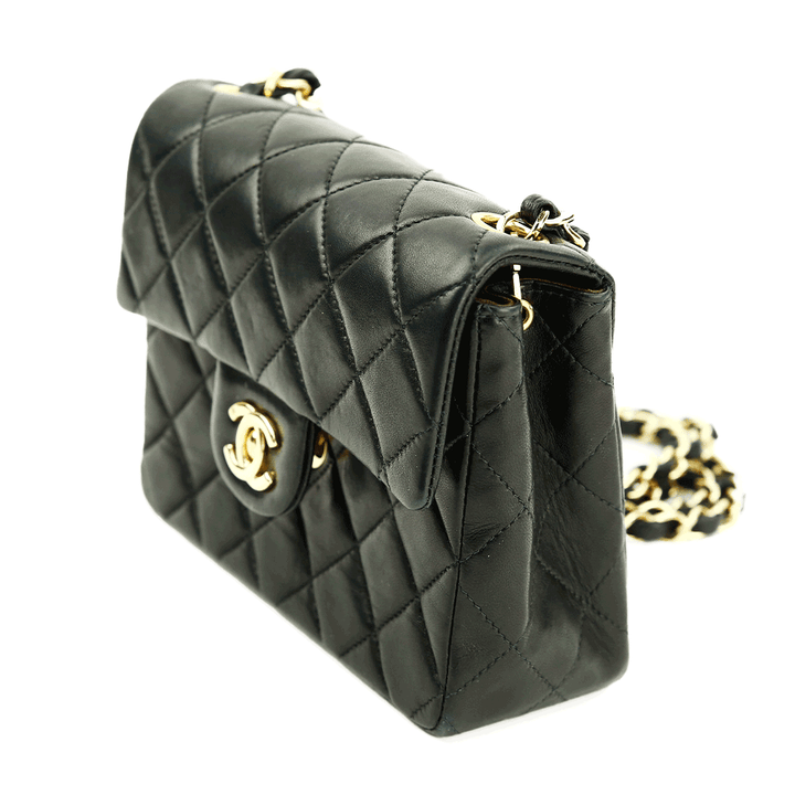 Side view of Chanel Black Lambskin Classic Square Mini Flap Bag (2000)