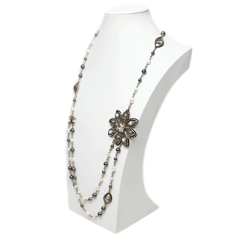 side view of Chanel Strass 
Enamel Pearl Station Necklace