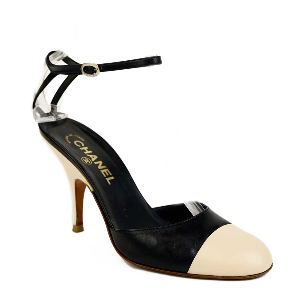 Chanel Black 
Cream Leather Ankle Strap Cap Toe Pumps