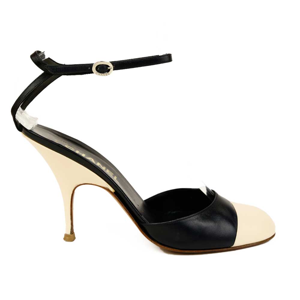 Chanel Black 
Cream Leather Ankle Strap Cap Toe Pumps