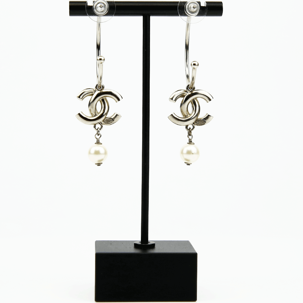 back view of Chanel Silver 
Enamel CC Hoop Earrings