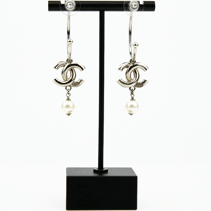 back view of Chanel Silver 
Enamel CC Hoop Earrings