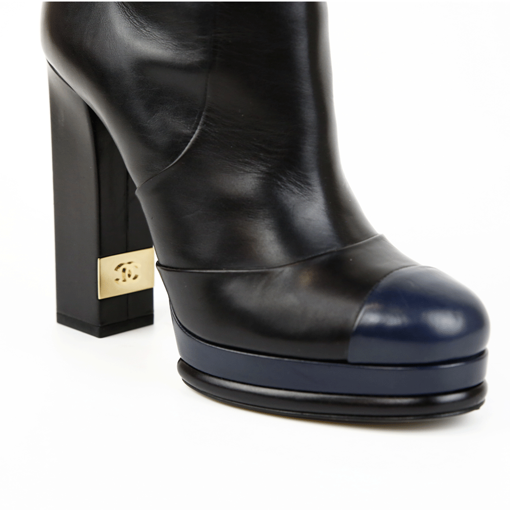 Chanel Black 
Navy Leather 2013 Cap Toe Boots