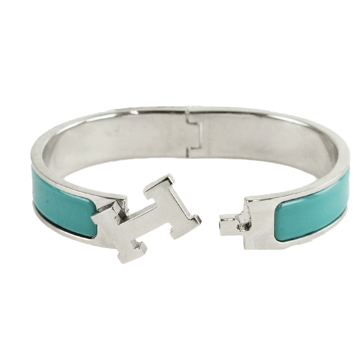 Front View of Hermès "Clic H" Blue 
Silver Narrow Bangle