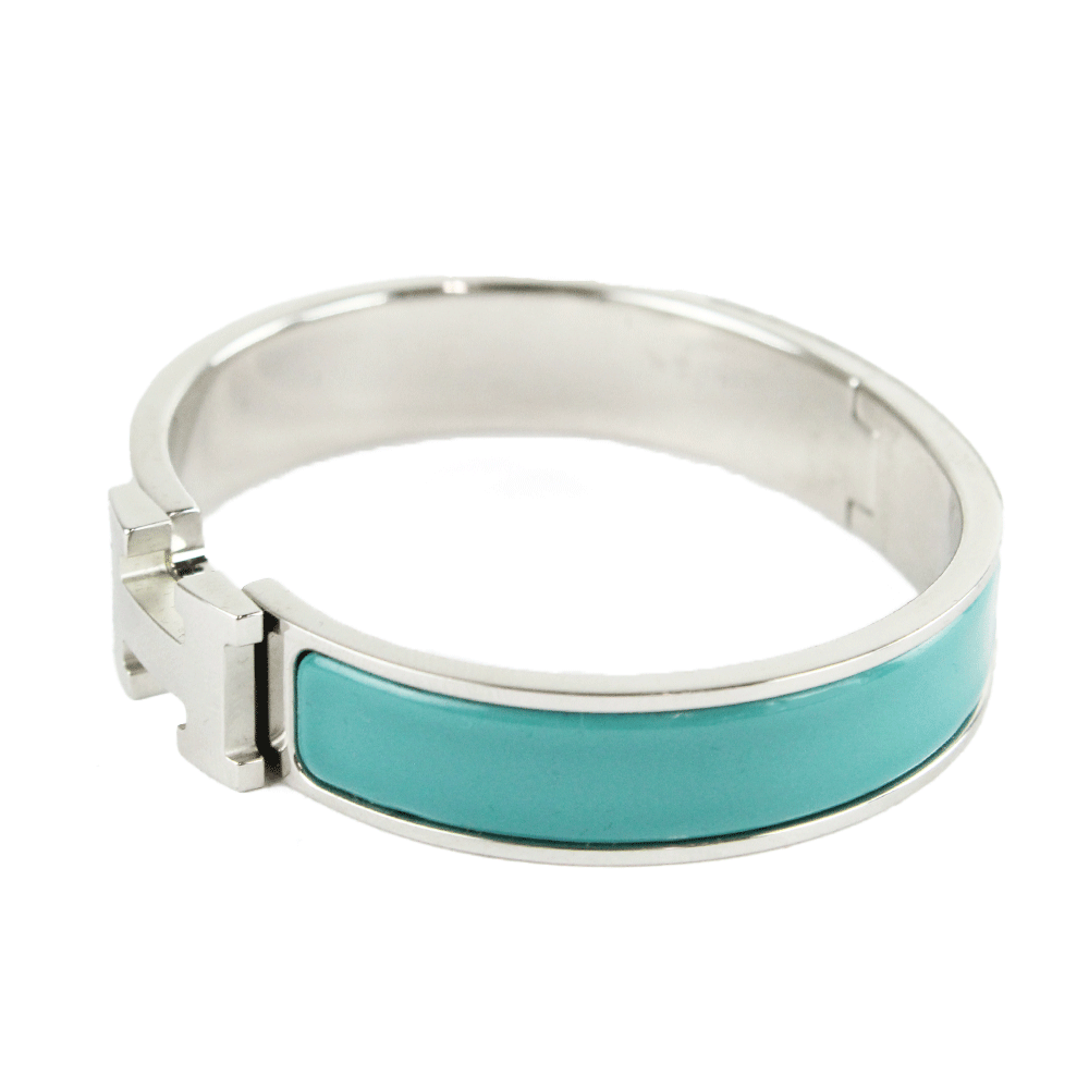 Side View of Hermès "Clic H" Blue 
Silver Narrow Bangle