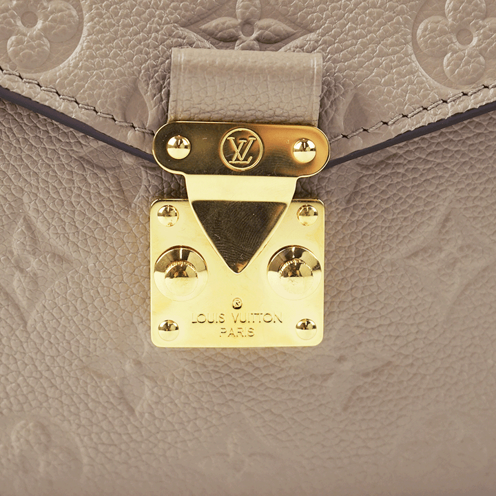 Front View of Louis Vuitton Pochette Metis in Turtledove Gray